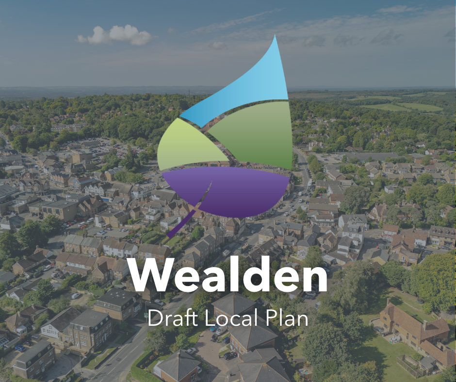 wealden local plan logo with housing develoment faded behind it.