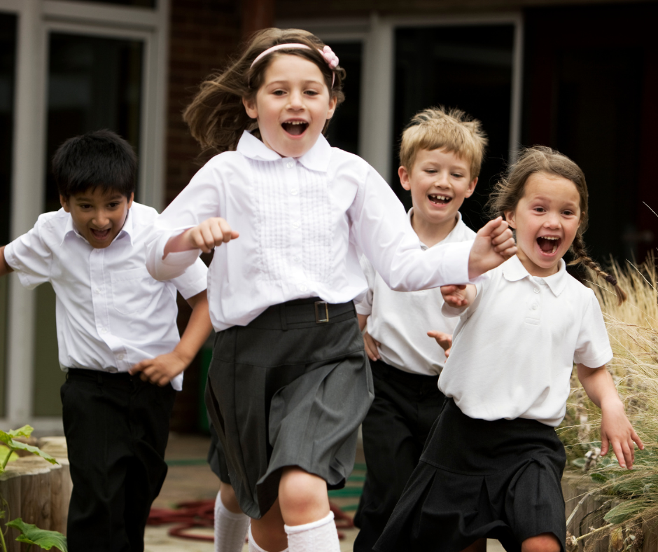 School children running out of classroom